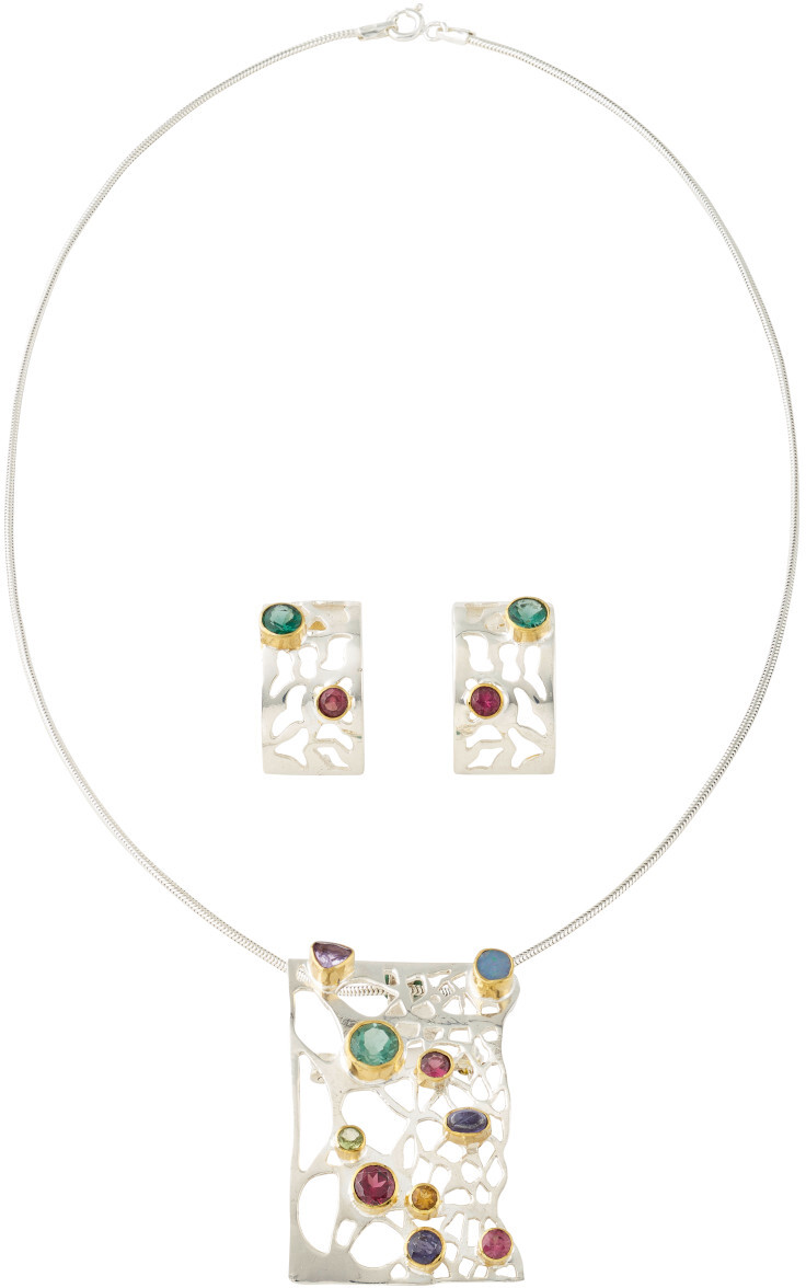Das Schmuckset 'Marisol' besteht aus einer silbernen Halskette und passenden Ohrringen, beide mit bunten Edelsteinen verziert. Das Design ist modern und auffällig.