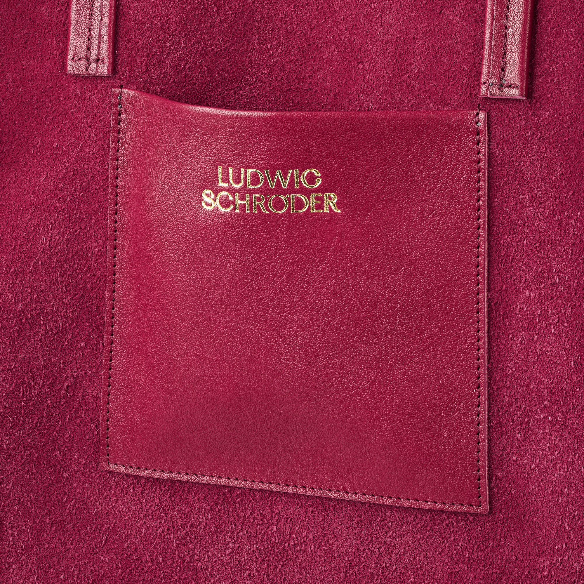 Ledershopper »Marie« in Rot mit goldenen Akzenten, hergestellt von Ludwig Schröder. Elegante und praktische Damenhandtasche.