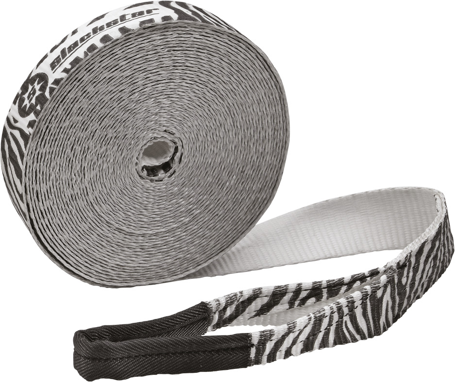 Eine Slackline mit Zebra-Muster, aufgerollt und teilweise abgerollt. Das Design ist in Schwarz-Weiß gehalten.