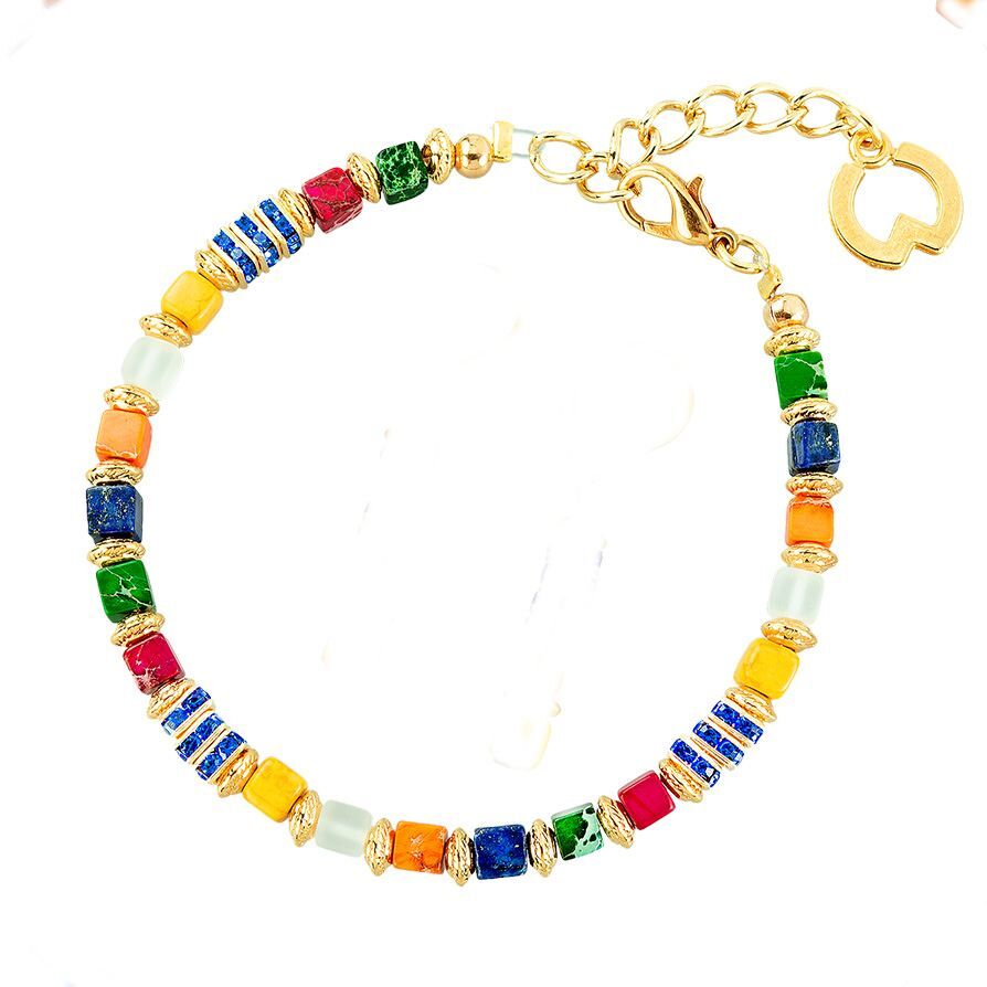 Farbenfrohes Schmuckset »Kolibri« – inspiriert von Franz Marc. Gold- und bunte Perlen, kunstvoll arrangiert als Armband.