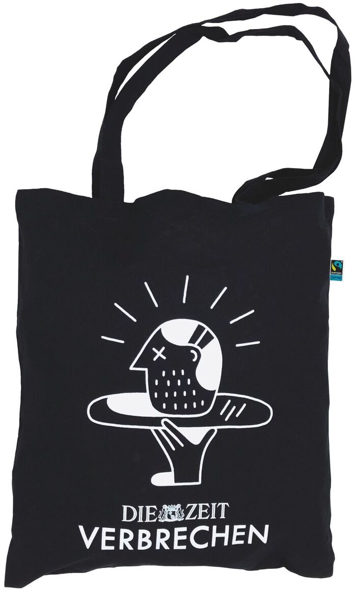 Schwarze Stofftasche mit weißem Aufdruck. Der Aufdruck zeigt einen abstrakten Kopf mit einer Sonnenstrahlen-Krone darüber und darunter den Schriftzug 'DIE ZEIT VERBRECHEN'. Die Tasche hat lange Henkel.
