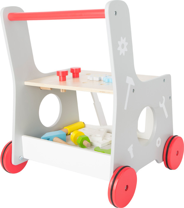 Ein grauer Lauflernwagen mit roten Rädern und einem roten Handgriff. Auf der Vorderseite sind verschiedene Werkzeuge und Zahnräder abgebildet. Der Wagen enthält eine Ablagefläche mit buntem Spielzeugwerkzeug wie Hammer, Schraubenschlüssel und Schrauben.