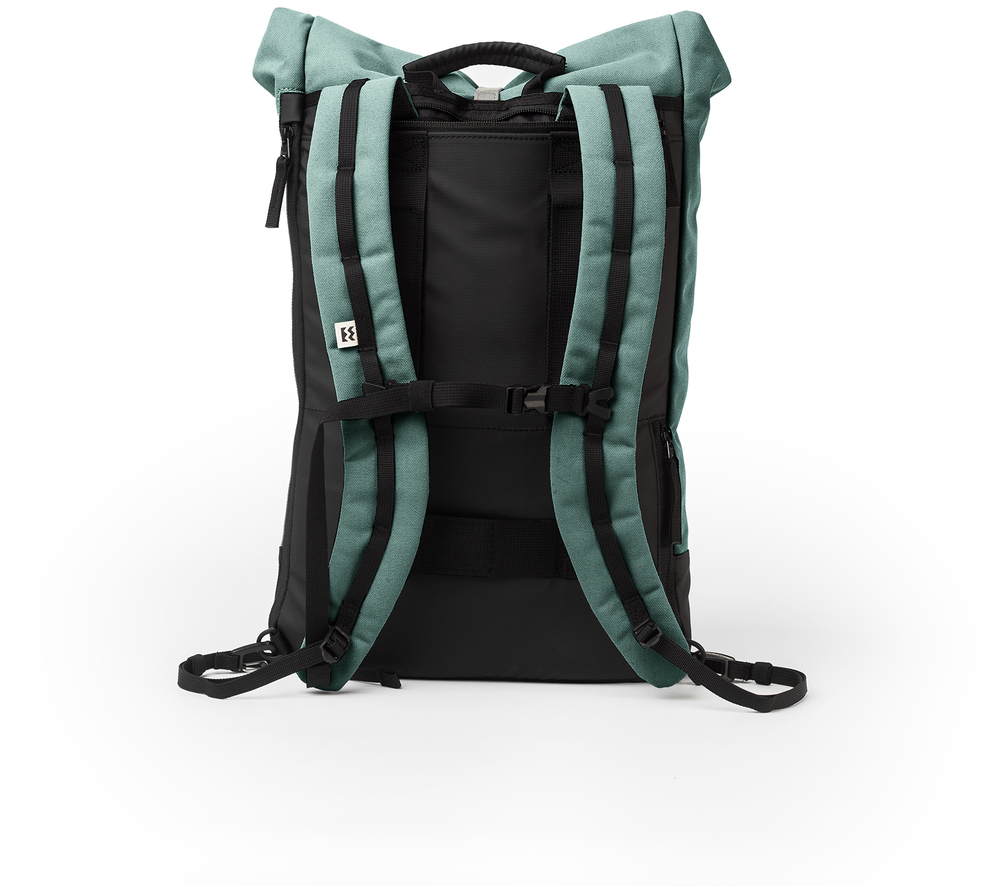 Ein grüner und schwarzer Fahrradtasche-Rucksack namens 'Annecy'. Die Tasche verfügt über verstellbare Gurte und eine ergonomische Form, ideal für Fahrradfahrer und Pendler.