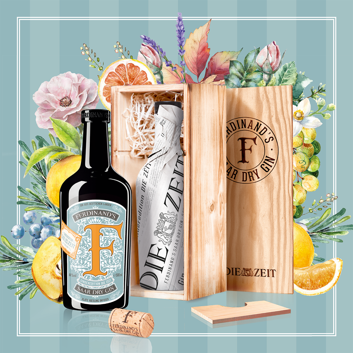ZEIT-Sonderedition Ferdinand's Saar Dry Gin in einer hölzernen Geschenkverpackung mit floralen und fruchtigen Dekorelementen.