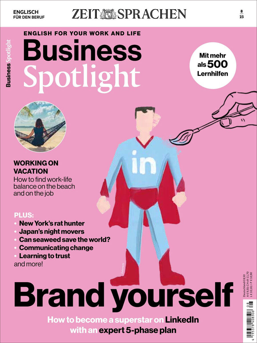 Eine Ausgabe des Business Spotlight Magazins vom August 2023. Das Cover zeigt eine Illustration einer Superheldenfigur mit dem LinkedIn-Logo auf der Brust vor einem rosa Hintergrund. Links oben der Titel des Magazins 'Business Spotlight', darunter der Untertitel 'English for your Work and Life'. Auf der linken Seite werden verschiedene Inhalte des Magazins aufgelistet.