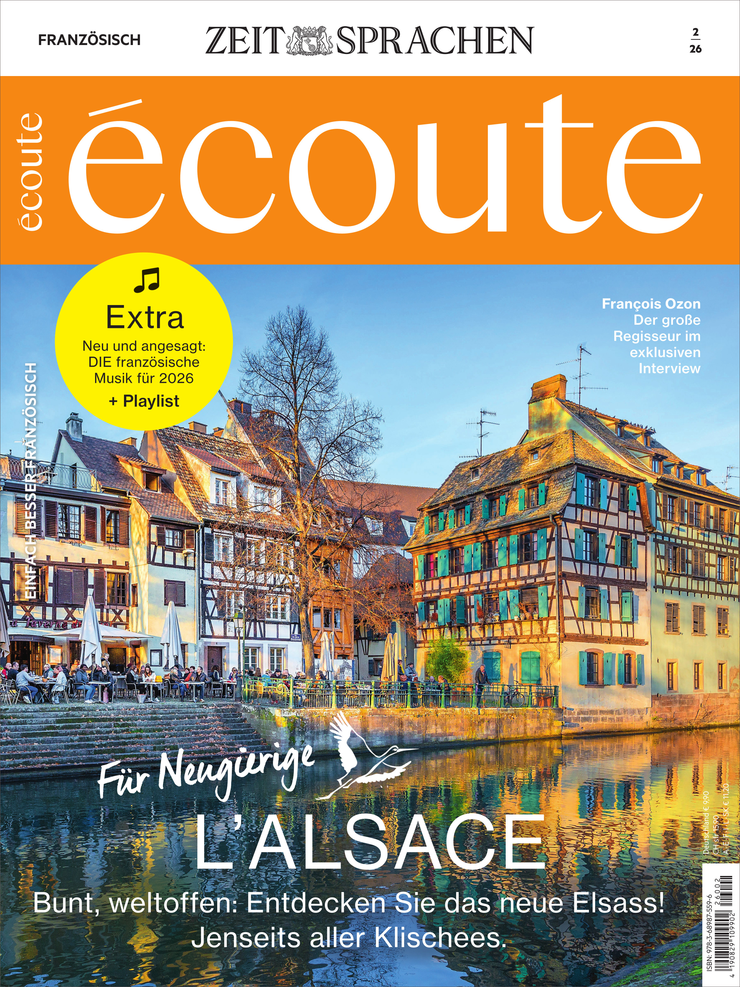 Titelbild des Écoute Magazins 2/2026 mit farbenfrohen Fachwerkhäusern am Wasser im Elsass vor blauem Himmel. Großes orangefarbenes Logo oben, weitere Texte und Empfehlungen, sowie ein Extra-Hinweis auf französische Musik und den Schwerpunkt L'ALSACE für Neugierige.